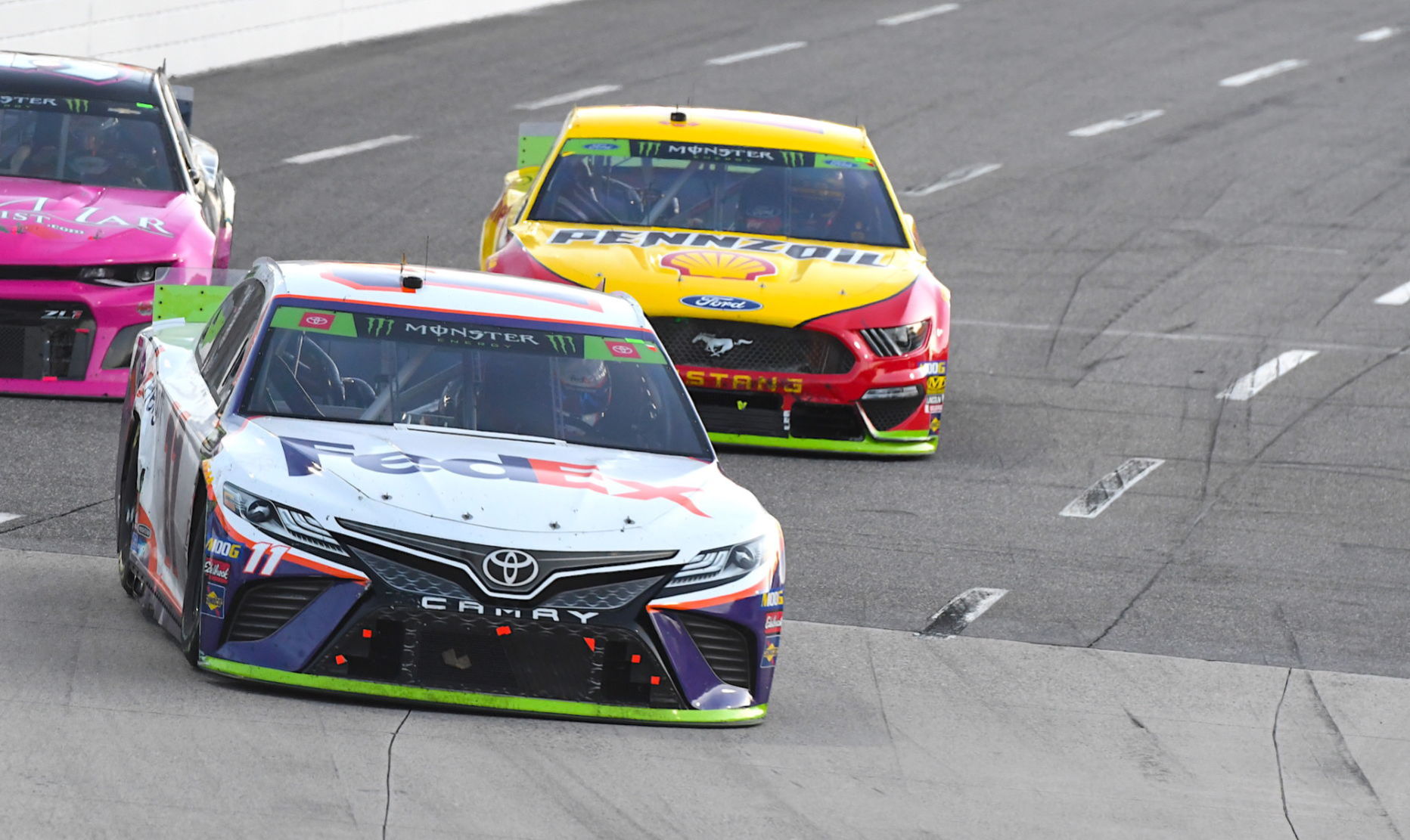 Hamlin leading Logano